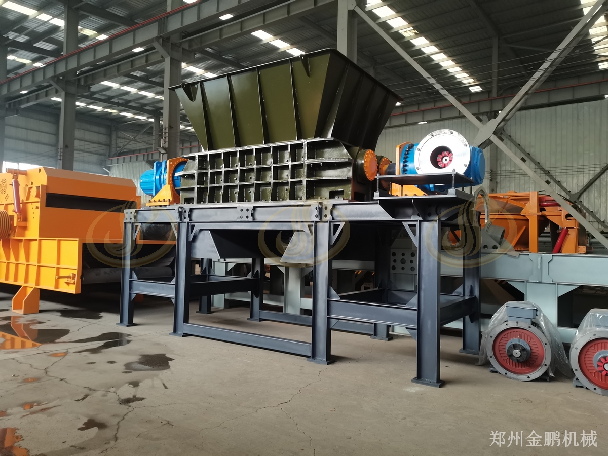工业固废双轴剪切撕碎机郑州金鹏用于园区破碎